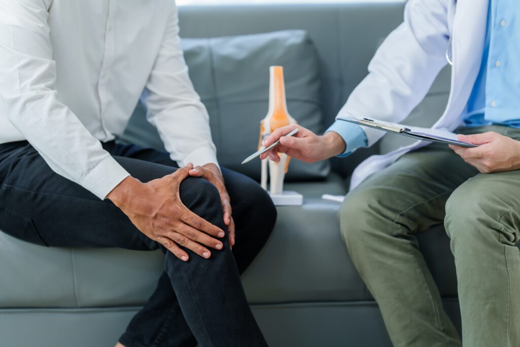 Naturopathy doctor and patient discussing treatment for chronic conditions.