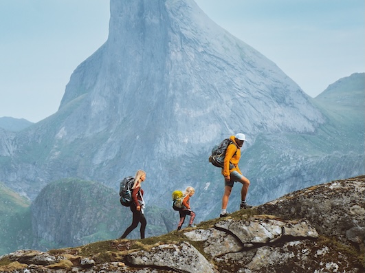 Vitality rush IV therapy option. People hiking up mountain.