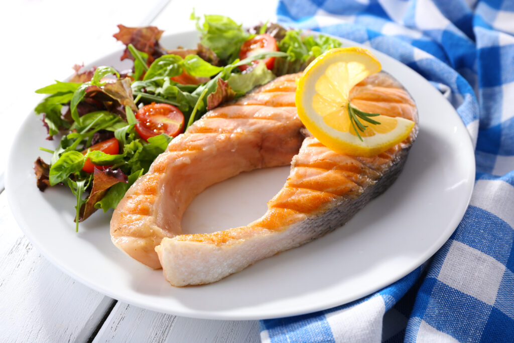 Salmon fish dinner as a healthy meal for skin health.