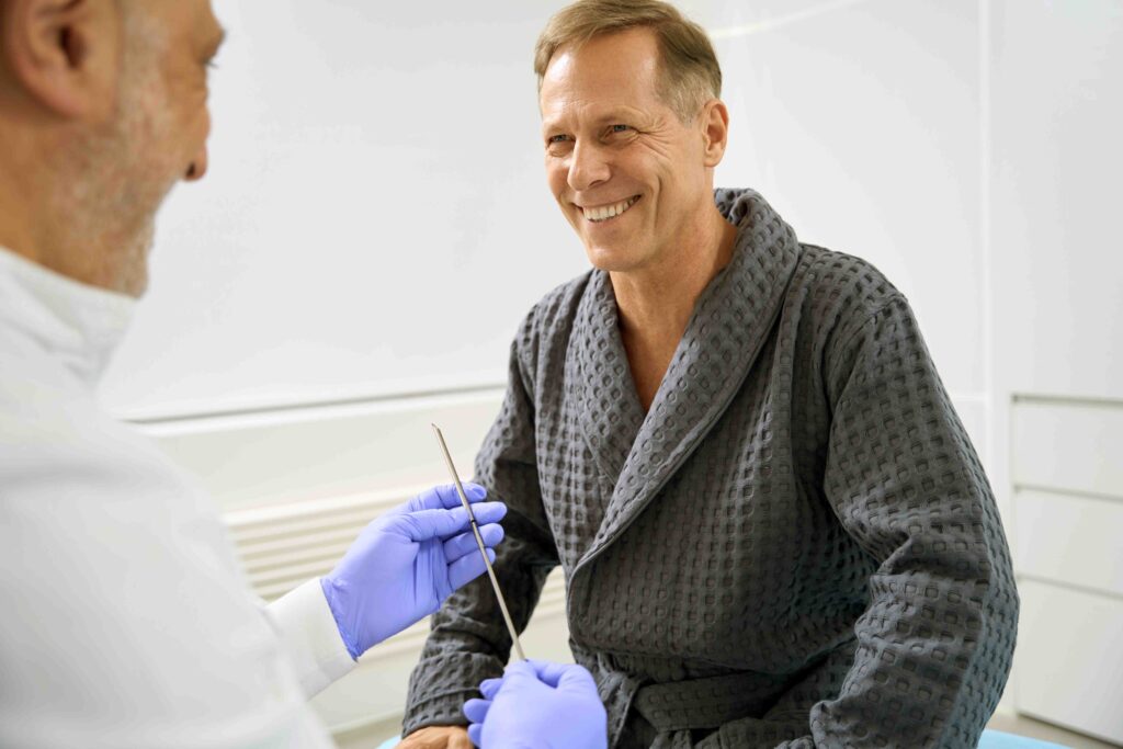 Doctor talking and smiling with patient.