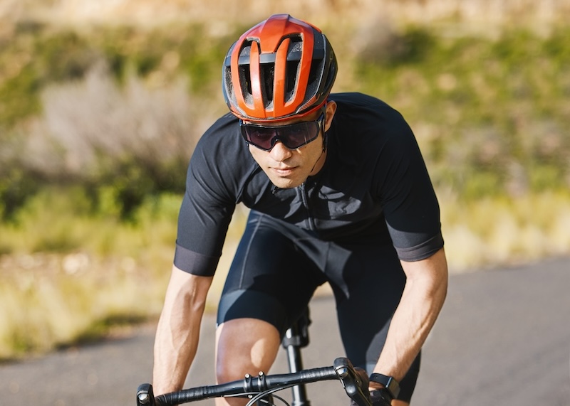 NAD Nirvana IV therapy option. Cyclist cycling outdoors.